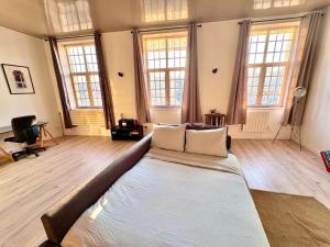 Appartements Loft T2 avec terrasse sur la Grand Place d-Arras : photos des chambres