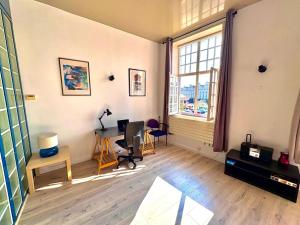 Appartements Loft T2 avec terrasse sur la Grand Place d-Arras : photos des chambres
