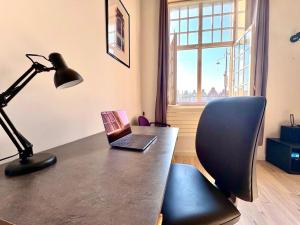 Appartements Loft T2 avec terrasse sur la Grand Place d-Arras : photos des chambres