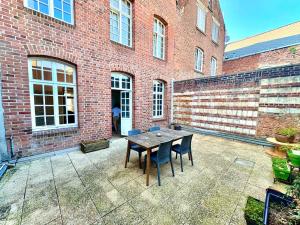 Appartements Loft T2 avec terrasse sur la Grand Place d-Arras : photos des chambres