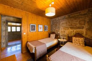 Casa da Capela by House and People