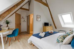 Maisons d'hotes Les Metairies d Arthur : photos des chambres
