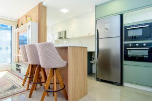 Apto moderno em Jurerê com piscina FR5722