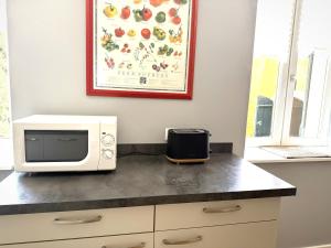 Appartements Domaine LE PRESSOIR - clim, wi-fi & parking : photos des chambres