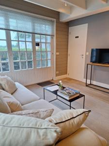 Suite with Terrace room in Casa-Cosi beautiful guesthouses for 1-4p with own kitchen reserved parking and private terrace in shared garden with seasonal pool and sauna minishop available for meals and breakfast or order breakfast basket