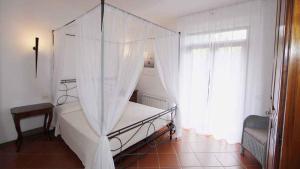 House and Apts. in Porto Azzurro 23632