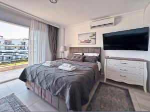 Thalassa Sunny Studio - 4hvězdičkové hotely ve městě Perivolia tou Trikomou