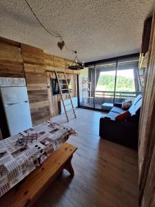 Appartements Studio cabine 4 pers Cosy esprit chalet Les glovettes : photos des chambres