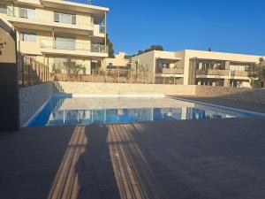 Appartements cozy studio, pool and beach : photos des chambres