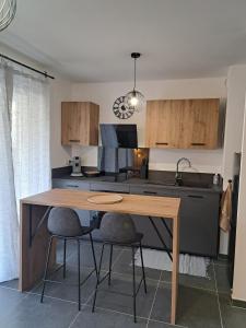 Appartements cozy studio, pool and beach : photos des chambres