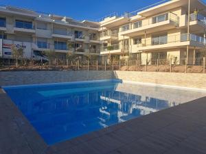 Appartements cozy studio, pool and beach : photos des chambres