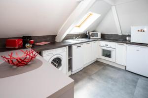 Appartements Le Balcon fleuri centre Robertsau tram Jardiniers : photos des chambres