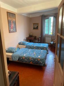 Maisons de vacances Petite maison authentique : photos des chambres