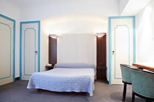 Hotels Hotel Mets et Plaisirs : photos des chambres