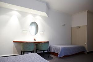 Hotels Hotel Mets et Plaisirs : photos des chambres