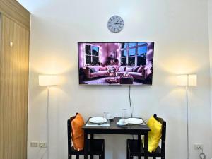 Cozy Luxe Stay 55 inch 4k Ultra TV and Amenity View