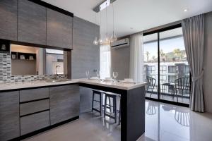 Fun, Beach & Topical Vibes! Pool View 2BR Apartment CTG P603-4 in Tropics Kamala Residence