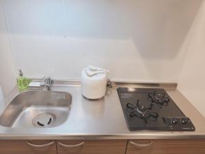 We support a comfortable trip, Direct access to Kansai Airport, Room in the heart of Osaka, Maximum 4 people, Room 402