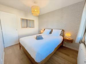 Maisons de vacances La Maison de Ranville - Entre Caen & la Mer avec jardin et parking gratuit : photos des chambres