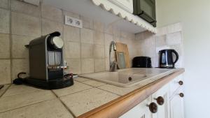 Appartements Studio les pieds dans l'eau : photos des chambres