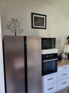 Appartements gite rustique de 2 chambres avec piscine commune : photos des chambres