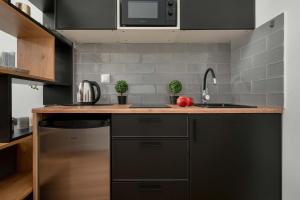 Intimate Studio Suitable for 2 People by Noclegi Renters