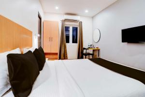 Townhouse Oak Bangalore Trinity Metro Station