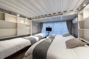 グラスキャビン浜松町aw Second and third floors