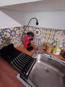 Appartements Studio chaleureux : photos des chambres