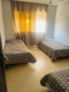 Charmant logement avec salon climatisé, à deux pas de BIM