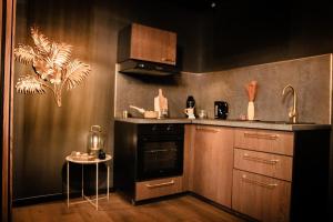Appartements L-Aphrodite, Suite de LUXE - Love room - JACUZZI : photos des chambres