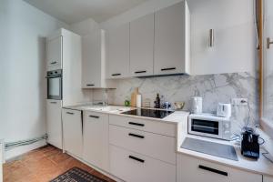 Appartements L-Arche des Carmes - Confort et Calme Hyper-centre : photos des chambres