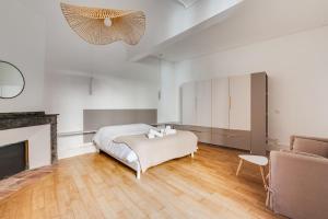 Appartements L-Arche des Carmes - Confort et Calme Hyper-centre : photos des chambres
