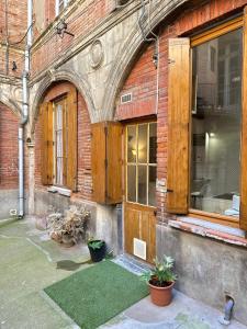 Appartements L-Arche des Carmes - Confort et Calme Hyper-centre : photos des chambres