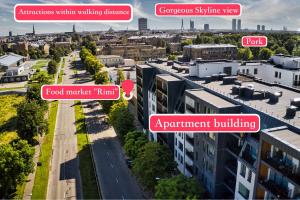 Scan QR code for apartment video tour - free parking, gym access, air conditioning, kitchen and more in central Riga