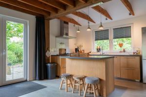 Prachtig genieten in het groen met royale tuin