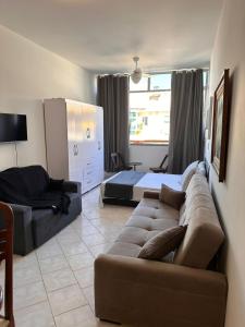 Studio 1 minuto da praia Vista mar lateral