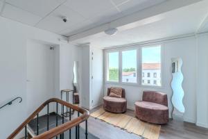 Appartements Jasmin Roanne centre-ville - Parking & Clim : photos des chambres
