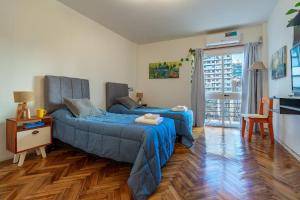 Estudio con dos camas individuales en Recoleta