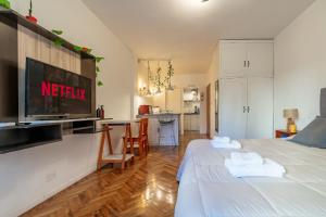 Estudio con dos camas individuales en Recoleta