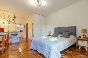 Estudio con dos camas individuales en Recoleta