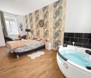 Appartements Jacuzzi prive, terrasse, Roubaix : photos des chambres