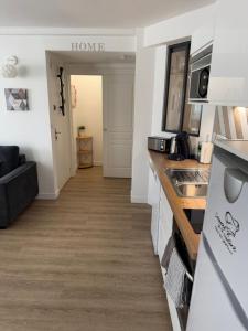 Appartement 40 m2 climatisé au centre ville de LGM
