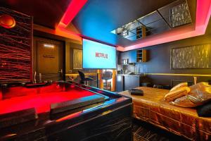Appartements LA GOLDEN ROOM - Suite de Luxe avec Jacuzzi : photos des chambres