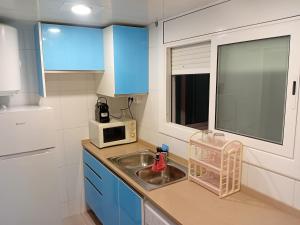 Apat sombrero A Cunit Beach