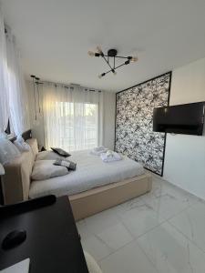 Villas Spacieuse Villa avec piscine : photos des chambres