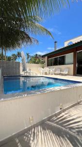 Casa Luxo em Condomínio 5 suítes 100 m da praia Ágata