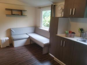 Campings Mobilhomes 6 & 4 pers a Ivry La Bataille Clim TV Wifi terrasse & confort Paris Eure Gestion : photos des chambres