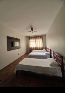 Apartamento 104 - Suíte econômica com ventilador