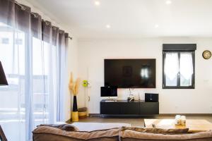 Appartements Lovely T3 : photos des chambres